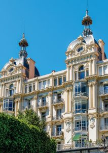 Luxury hotel "Excelsior Regina Palace" on hill of Cimiez. Palace built in 1896 by architect Biasini for English aristocrats and essentially Queen Victoria. Nice, French Riviera, France. July 11, 2014.